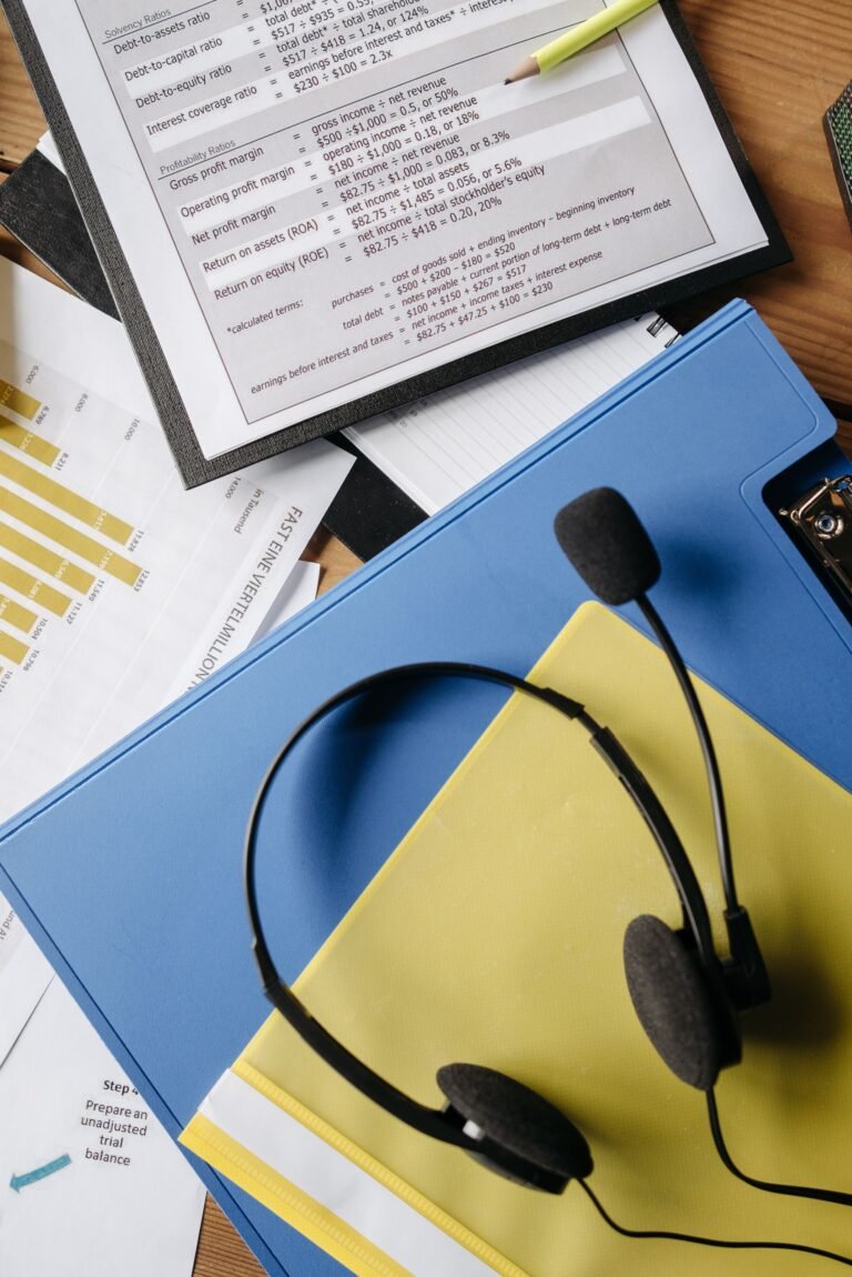 Desk with charts and a headset