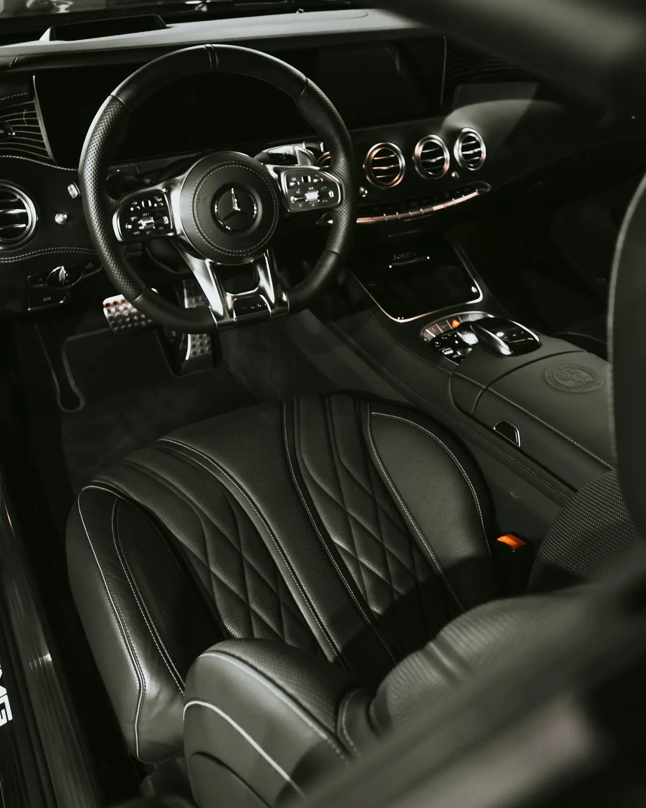 Black leather rear seats inside a luxury car